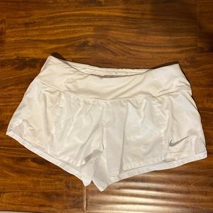 White Nike shorts